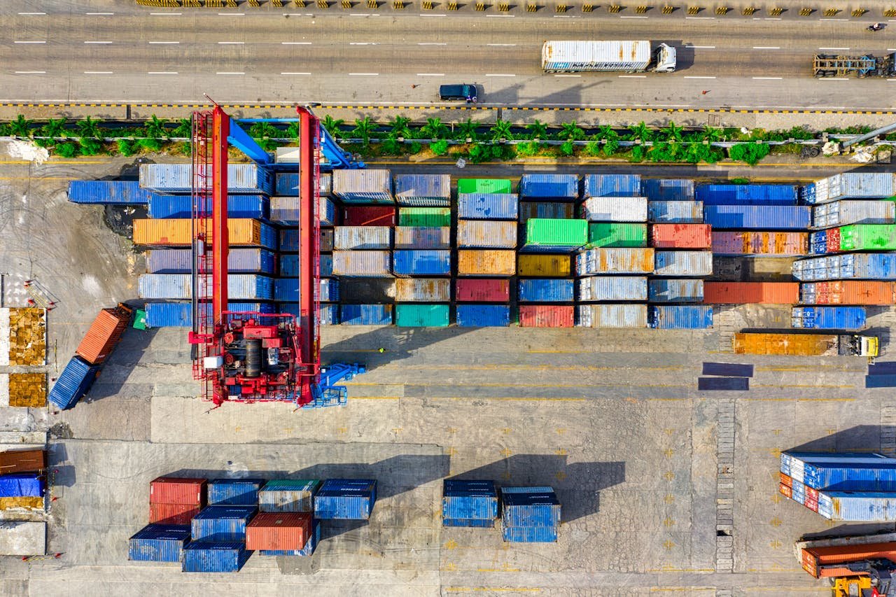 digital Colorful cargo containers organized at a shipping yard in North Jakarta, Indonesia.